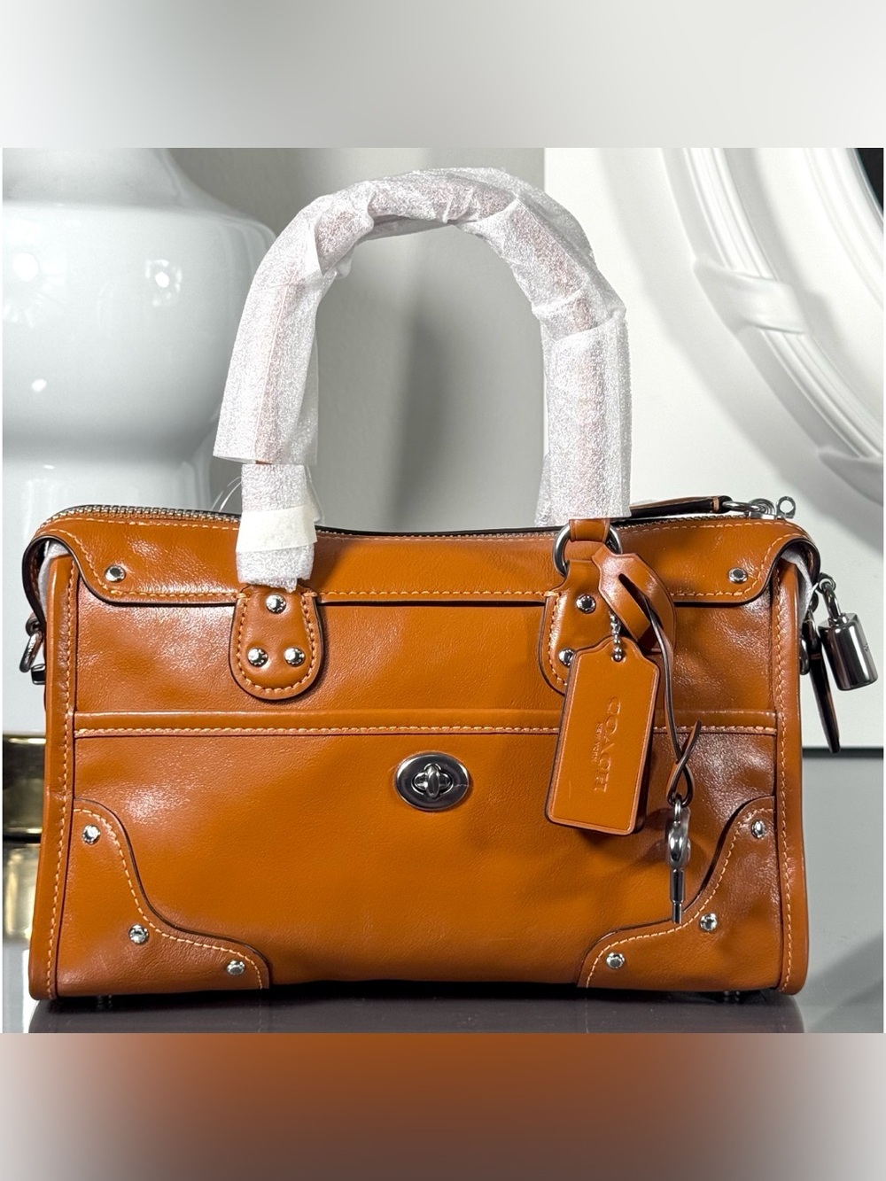 COACH Rhyder Satchel Bag 24, AMBER BROWN